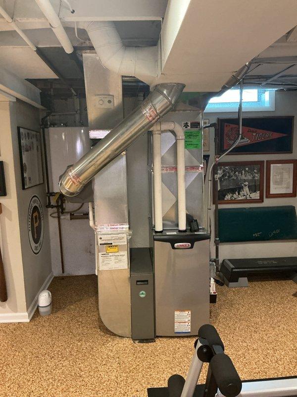 Responded to service call for central air conditioning system with minimal cooling capacity. Upon inspection, found system blower operational but inadequate temperature reduction after extended runtime. Performed diagnostic assessment of furnace and air handler unit located in basement mechanical room, evaluated refrigerant levels, airflow, and system components. Identified cooling deficiency preventing proper temperature drop in conditioned space and provided recommendations for restoring full system functionality before peak cooling season.