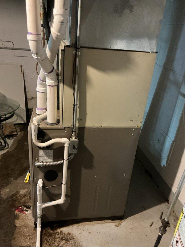 Provided estimate for replacement of failed air conditioning system and evaporator coil serving basement-located natural gas furnace installation. Existing 10+ year old equipment no longer operational, requiring complete AC system replacement including outdoor condensing unit and indoor coil component compatible with current air handler.