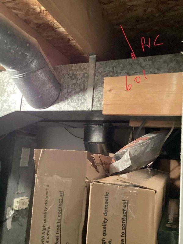 Conducted comprehensive HVAC replacement estimate for residential property with 4.5-year-old air conditioning system. Inspected basement-located air handler and evaporator coil, evaluated attic ductwork including metallic supply runs and insulation conditions, and assessed existing Honeywell digital thermostat functionality. Documented equipment locations, system accessibility, and replacement requirements through photographic documentation of mechanical spaces and control devices.