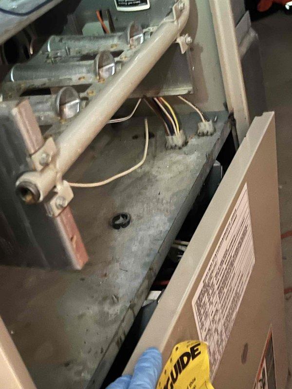 Responded to service call for non-operational air conditioning system on recent installation. Upon arrival, performed comprehensive system diagnostics using digital manifold gauges and temperature sensors. Inspection revealed system was in vacuum state with both suction and discharge pressures reading -61.3 PSIG, indicating complete refrigerant loss or system not properly charged during initial installation.

Conducted thorough leak check of all refrigerant lines, connections, and components. Removed access panel to inspect interior furnace components and verify proper installation of refrigerant lines and electrical connections. Verified all wiring connections to gas valves, control boards, and safety devices were secure. Measured system airflow temperatures with return dry bulb at 79.4°F, return wet bulb at 65.5°F, supply dry bulb at 54.6°F, and supply wet bulb at 51.5°F using calibrated digital instruments.

Evacuated system to proper vacuum levels, pressure tested for leaks, and re