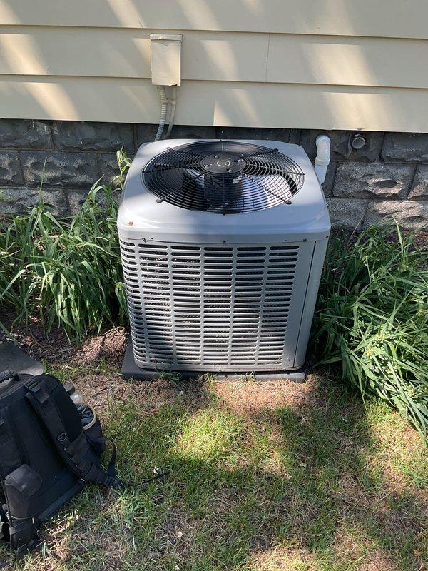 Completed Gold AC inspection on single residential air conditioning system with air handler located in basement. Performed comprehensive evaluation of outdoor condenser unit and indoor components, confirmed system operational status, and documented equipment condition through photographic records. All inspection points completed per Gold service protocol.