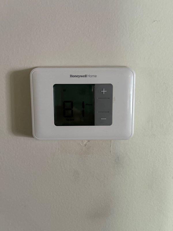 Successfully completed full HVAC system installation including a 70,000 BTU furnace with 180-degree rotation configuration, 2-ton air conditioning unit with rear positioning, humidifier, and APCO air purification system. Installed condensate pump, ran 500 feet of refrigerant lines, and reconnected all electrical components to existing service panel. Requested and coordinated mechanical and electrical permits, programmed new Honeywell Home digital thermostat, and completed all required documentation for utility rebate processing.