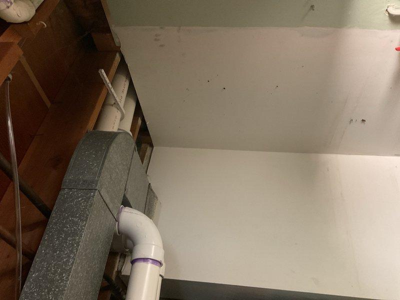Completed full HVAC system installation including 90,000 BTU high-efficiency furnace and 3.5-ton air conditioning unit in rear yard location. Installed new thermostat, humidifier, base platform, and 600 CFM condensate pump with proper drainage piping. All PVC condensate lines properly primed and secured with multiple connection points routed through utility space. Air handler mounted with metallic supply and return ductwork including flexible and rigid sections with appropriate elbow transitions. System reconnected to existing infrastructure with all electrical connections completed and safety labels verified. Mechanical permit requested and AHRI certificate number 215665938 documented for utility rebate processing. All components tested and operational upon completion.