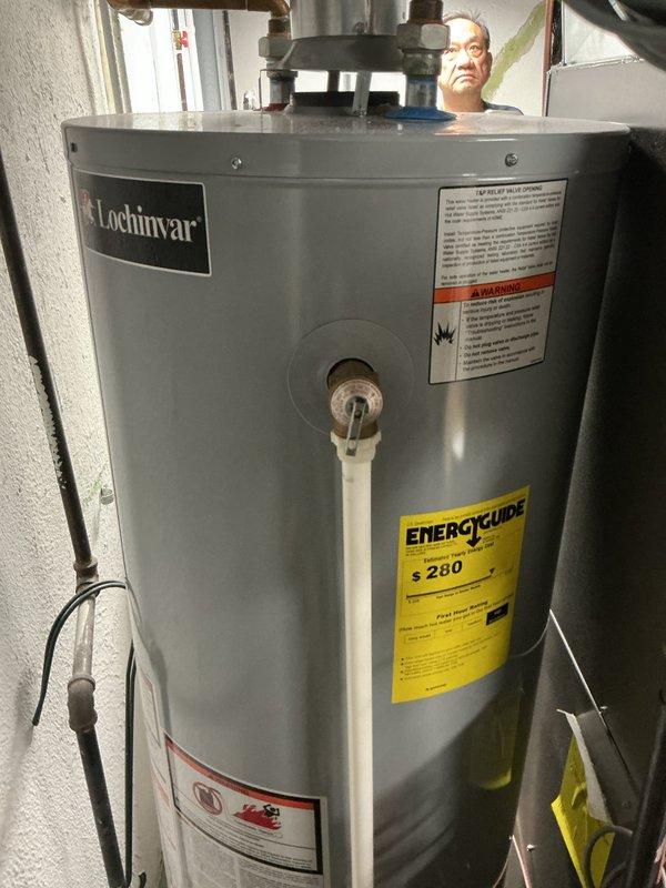 Provided comprehensive quote for utility sink replacement including new basin unit, faucet assembly, and cleanout drain installation. Assessed existing white utility sink mounted on black legs with chrome fixtures and flexible drainage components. Evaluated plumbing configuration in utility room adjacent to water heater and laundry appliances to determine scope of replacement work and material requirements.