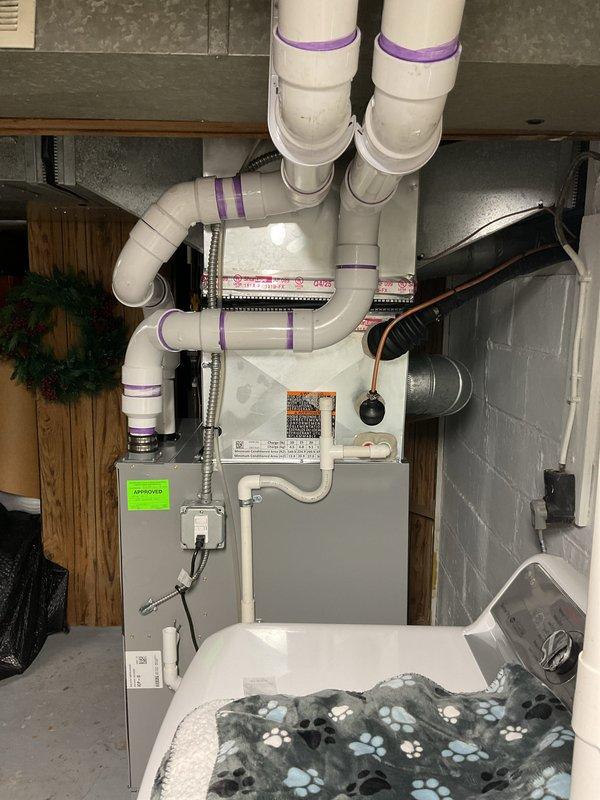 Completed installation of 4-ton air conditioning system with uncased evaporator coil on existing furnace unit. Connected refrigerant lines to right-side configuration, installed necessary ductwork modifications, and completed all electrical reconnections. Mechanical, electrical, and air conditioning permits were obtained prior to installation, and system was tested for proper operation upon completion.