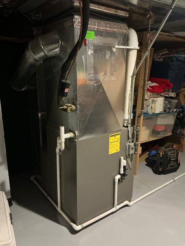 Completed Gold-level air conditioning inspection on 16+ year old system with evaporator coil located in basement. Performed comprehensive system evaluation, verified operational status of all components, and documented equipment condition with photographic records. Unit confirmed to be functioning properly at time of service.