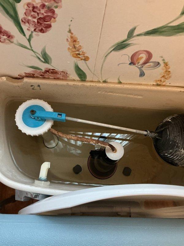 Responded to a non-functioning toilet handle on the first-floor toilet that required manual flushing by opening the tank. Upon inspection, found the flush lever mechanism disconnected from the flapper valve assembly. Reconnected the lift chain to the flush handle arm, adjusted chain length for proper tension, and tested flush operation multiple times to ensure reliable performance. Toilet now flushes normally with handle operation restored.