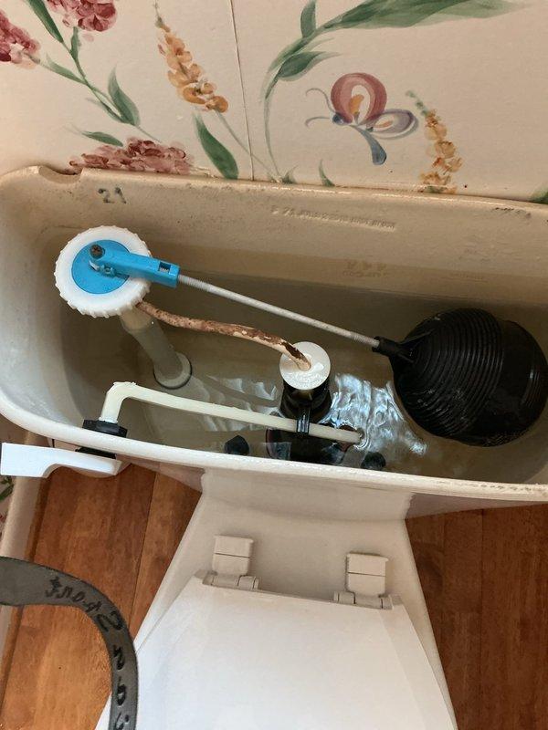 Responded to a non-functioning toilet handle on the first-floor toilet that required manual flushing by opening the tank. Upon inspection, found the flush lever mechanism disconnected from the flapper valve assembly. Reconnected the lift chain to the flush handle arm, adjusted chain length for proper tension, and tested flush operation multiple times to ensure reliable performance. Toilet now flushes normally with handle operation restored.
