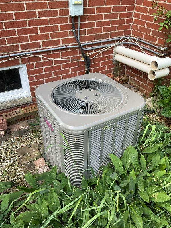 # HVAC Maintenance - Gold AC Inspection

Completed comprehensive Gold AC Inspection on multi-unit system with mini split/air handler located in basement and second floor. Performed standard maintenance protocol including visual inspection of all accessible components, verification of proper system operation, and documentation of equipment condition.

## Equipment Inspected

**Outdoor Unit:**
- Inspected cylindrical outdoor condensing unit positioned at building exterior
- Verified fan grille operation and assessed overall unit condition
- Examined refrigerant line sets and insulation integrity
- Noted manufacturer specifications and unit placement in landscaped area

**Indoor Components:**
- Inspected basement air handler and associated mechanical equipment
- Examined copper refrigerant piping and brass fitting connections
- Documented pressure-rated components (MAX 950PSI fitting observed)
- Assessed mounting hardware and connection points

## Observations

During inspection, identifi