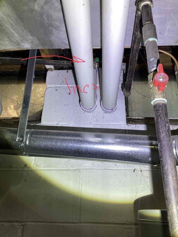 Conducted HVAC system evaluation for replacement estimate on residential air conditioning unit over 10 years old with basement-located air handler. Assessed existing equipment configuration including evaporator coil setup and provided pricing options for both cased and uncased coil replacements. Documented current system installation including PVC condensate drainage, refrigerant lines with insulation, and shut-off valve locations to determine optimal replacement specifications and equipment compatibility for complete system upgrade.