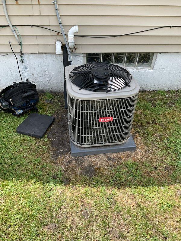 Completed routine AC tune-up on 5-year-old residential air conditioning system as part of prepaid Gold plan maintenance. Performed comprehensive inspection of outdoor condenser unit, verifying proper operation of fan motor and compressor. Checked refrigerant levels and confirmed system pressures within manufacturer specifications. Inspected electrical connections and wiring for signs of wear or corrosion. Evaluated condenser coil condition and airflow through metal grille cage. Replaced indoor air filter with new pleated media filter to ensure optimal airflow and system efficiency. Verified PVC condensate drain line routing and confirmed proper drainage. Inspected equipment mounting pad and foundation for stability. System operating normally with no issues identified. All components functioning as designed with no repairs required at this time.