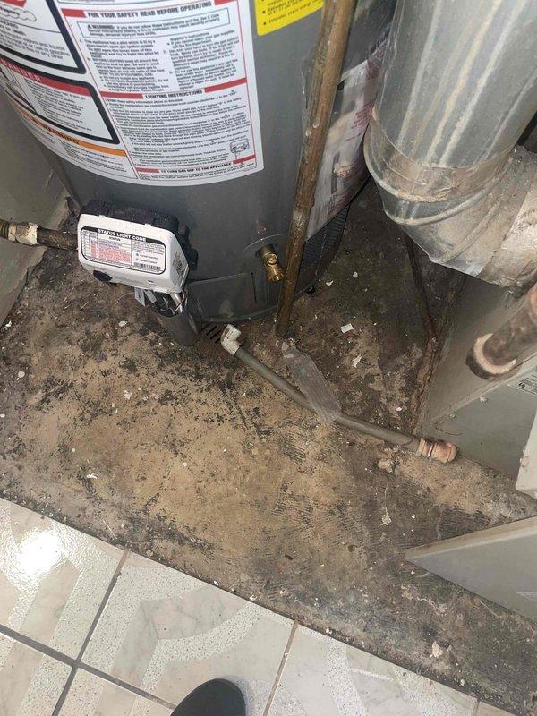 Conducted comprehensive assessment of existing heating and cooling system in residential utility closet for complete HVAC replacement estimate. Evaluated current natural gas furnace and air conditioning equipment configuration, including condensate drain assembly with PVC drainage lines, copper refrigerant lines with foam insulation showing frost accumulation indicative of temperature differential, and galvanized ductwork distribution system. Documented mechanical space conditions including water heater proximity, available clearances for new equipment installation, and utility area access constraints. Photographed existing system components, refrigerant line insulation condition, condensate management setup, and overall equipment layout to provide accurate replacement specifications for small residential application up to 1500 square feet.