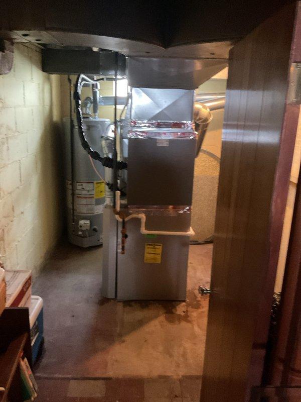 Completed installation of 2.5 ton air conditioning system with matching evaporator coil in rear discharge configuration. Installed 16x25x4 filter, condensate pump, and performed system flush to ensure proper operation. Obtained mechanical, electrical, and HVAC permits prior to installation, reconnected all electrical and refrigerant lines, and verified system performance upon startup.
