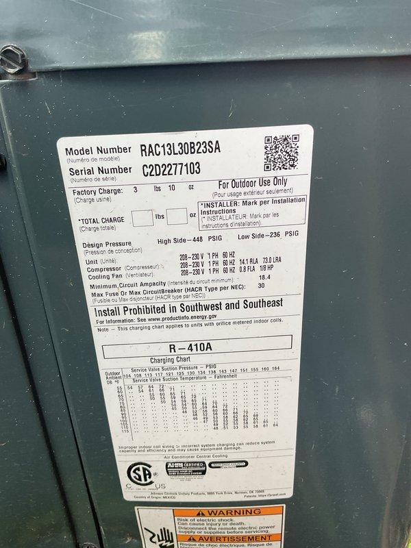 Completed Gold AC Inspection on a 9-year-old single-zone system with air handler located in basement. Performed comprehensive inspection of outdoor condenser unit model RAC13L30B23SA, verified proper refrigerant charge levels for R-410A system, inspected brass fittings and connections, and documented equipment specifications and operational status. Unit confirmed to be operating properly with no issues identified during inspection.