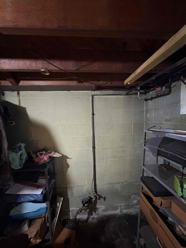 Completed 100-amp electrical panel upgrade in basement utility area. Installed new panel enclosure with dual-row circuit breaker configuration and copper bus bar system. Permit was requested for the installation, and work was performed to prepare electrical service for upcoming HVAC system installation.