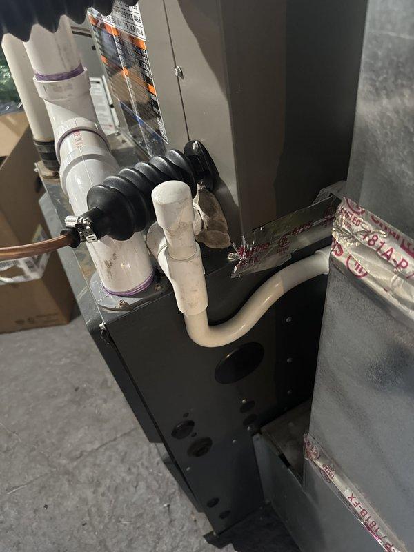 Successfully completed installation of 2.5-ton air conditioning system with new evaporator coil in rear yard location. Installed Goodman furnace with proper venting using white PVC piping, condensate pump assembly with drainage system, and coordinated all necessary ductwork connections. New electrical circuit installation was required and mechanical, electrical, and AC permits were obtained prior to work commencement.