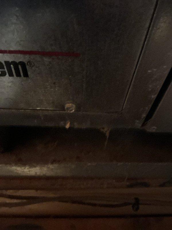 Responded to no-cool complaint on 12-year-old split system with both outdoor condenser and attic-mounted air handler/blower motor inoperative. Upon arrival, performed diagnostic evaluation of complete system including electrical components, compressor operation, and blower motor functionality. Accessed attic unit and exterior condenser to assess equipment condition and operational status. Documented existing equipment configuration with photographic evidence showing refrigerant line connections, ductwork installation, and overall system condition in attic space. Given the age of the equipment at 12 years and complete system failure affecting whole-house comfort, presented comprehensive replacement options for same-day installation as requested. Discussed benefits of full system replacement versus repair costs on aging equipment that has reached typical life expectancy. Customer approved complete HVAC system replacement. Removed existing 12-year-old outdoor condensing unit and attic air