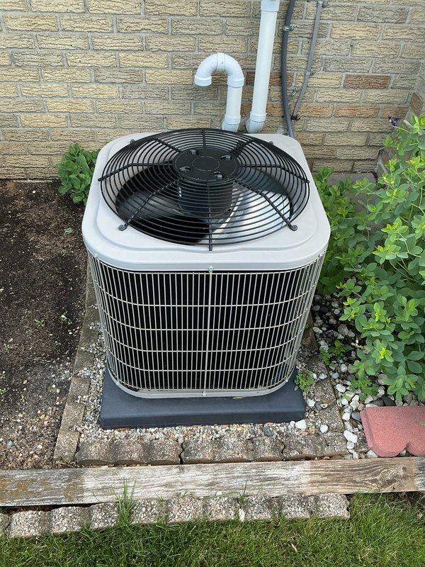 Completed comprehensive Gold AC inspection on a 4-year-old residential air conditioning system with basement-located air handler. Performed multi-point inspection of outdoor condenser unit, verified proper operation of all components, checked refrigerant levels, inspected electrical connections, and assessed overall system performance. Unit found operating within normal parameters with no immediate service needs identified.