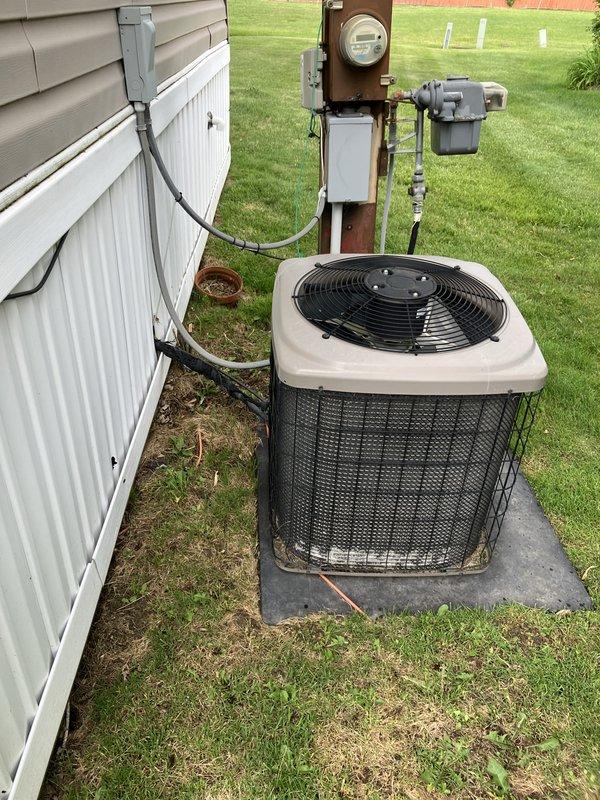 Conducted comprehensive full system estimate for residential HVAC replacement. Evaluated existing outdoor condensing unit and indoor furnace components, documenting current equipment configuration including gas valve assembly, refrigerant line connections, and electrical service. Measured clearance dimensions for equipment access and replacement feasibility. Assessed outdoor unit placement on concrete pad, electrical disconnect, and meter configuration. Photographed existing system components to document current installation conditions. Provided homeowner with multiple equipment options and financing alternatives for complete central air conditioning system replacement and potential furnace upgrade.