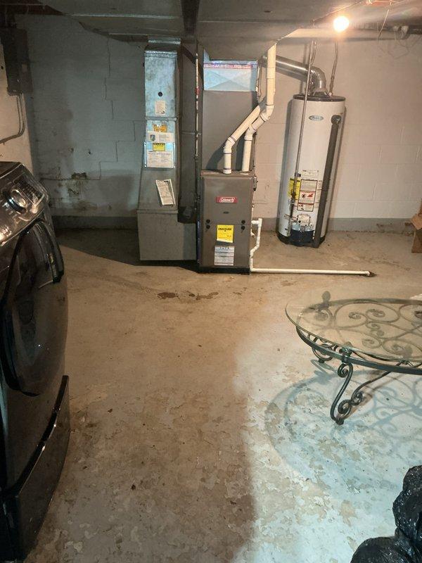 Completed installation of 2.5-ton air conditioning unit with matching evaporator coil in residential basement location. System was installed per manufacturer specifications, refrigerant lines were connected, electrical wiring completed, condensate drain established, and unit tested for proper operation. AC permit was requested for mechanical installation, all connections verified, and system commissioned successfully with customer payment received upon completion.