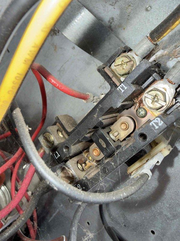 Completed comprehensive Gold AC Tune-Up on 10-year-old air conditioning system. Performed thorough inspection of electrical connections, contactors, and terminal blocks, verifying all wire terminations were secure and properly torqued. Measured supply air temperature at 65.3°F using calibrated digital thermometer to confirm system operation. Cleaned accumulated dust and debris from electrical components and enclosure, inspected condenser unit located at rear of property, checked refrigerant levels, and verified proper system cycling and performance parameters are within manufacturer specifications.