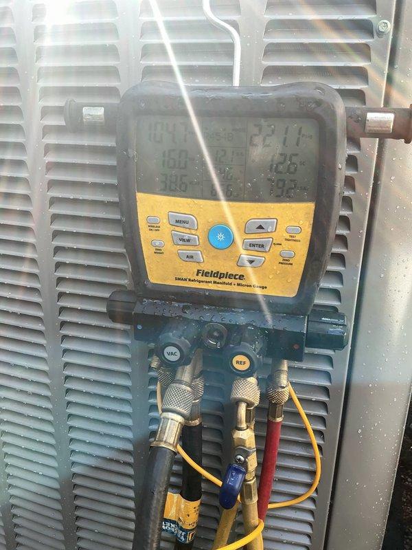 Completed full HVAC system installation including 110,000 BTU furnace, 4-ton air conditioning unit, whole-house dehumidifier, humidifier, condensate pump, and S40 thermostat. Obtained mechanical and electrical permits prior to installation. Installed equipment base pad for outdoor condenser unit positioned at rear of property. Performed system startup, refrigerant charge verification using manifold gauges with readings documented at 221 PSI, and completed all electrical reconnections. Remeasured ductwork for proper airflow distribution and registered system with AHRI certificate number 216726236 for utility rebate eligibility through Consumers Energy and DTE programs.