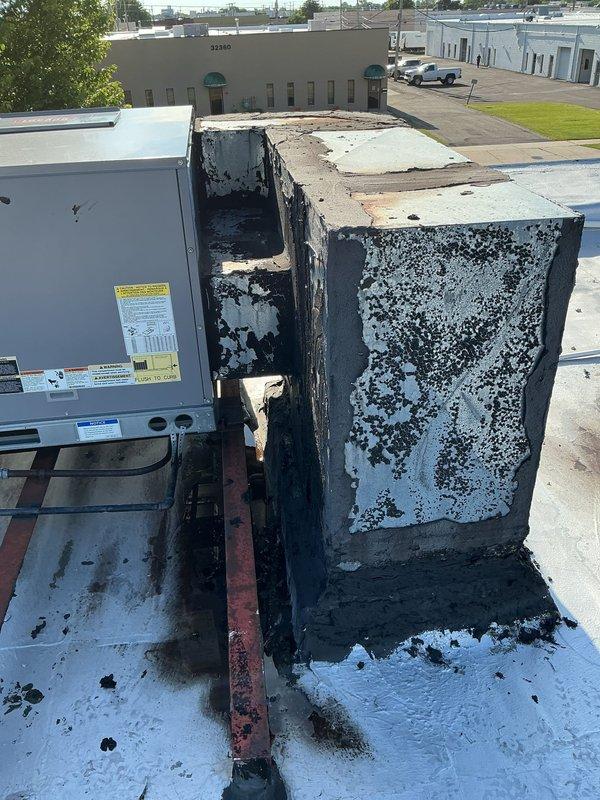 Performed yearly maintenance on rooftop RTU unit and conducted comprehensive leak search on associated ductwork. Upon arrival, accessed roof via ladder and inspected equipment, discovering significant exterior deterioration on primary RTU unit with extensive coating degradation and visible rust-colored staining on roof membrane beneath unit, indicating potential water intrusion. Completed thorough inspection of ductwork system to identify source of reported leak, examined all accessible connections, seams, and penetrations. Documented equipment condition with photographic evidence showing advanced weathering and corrosion on unit casing. Performed standard maintenance procedures including filter inspection, electrical connection verification, and operational testing of RTU components. Identified areas requiring immediate attention due to compromised exterior surfaces and potential water damage to roofing substrate. Provided recommendations for equipment repair and preventive measures t
