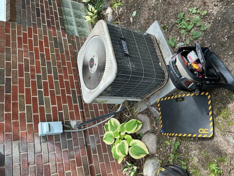 Completed comprehensive tune-up inspection on 15-year-old outdoor air conditioning condenser unit. Performed diagnostic testing using digital multimeter to verify electrical components, checked refrigerant lines, inspected condenser coils and fan operation, and evaluated overall system performance. Additionally inspected basement equipment including humidifier, thermostat, and hot water tank to ensure proper operation of all HVAC and related systems.