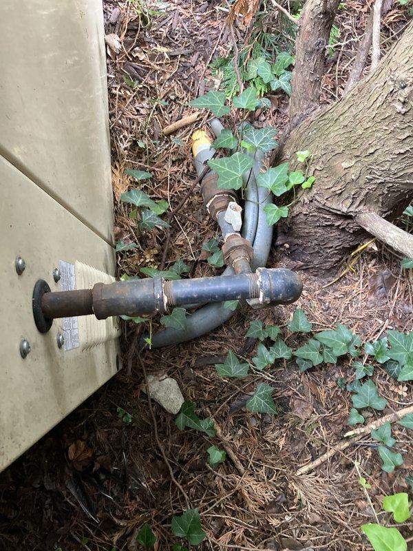 Conducted electrical estimate for whole home generator replacement at residential property. Assessed existing generator installation including propane fuel line connections, mounting pad dimensions, and equipment placement in exterior location. Documented current system configuration with measurements of concrete pad and photographed existing piping connections to prepare comprehensive replacement proposal.