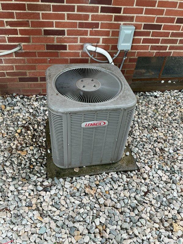 Completed comprehensive Gold AC Inspection and tune-up on Lennox outdoor condensing unit as part of annual preventive maintenance plan. System was operational upon arrival and confirmed working properly throughout inspection. Performed complete diagnostic evaluation including refrigerant level verification, electrical component testing, condenser coil cleaning, and airflow measurements. Inspected and tested all safety controls, contactors, and capacitors for proper operation. Verified correct amperage draw on compressor and fan motor. Cleaned condenser unit exterior and cleared debris from surrounding area. All components found to be functioning within manufacturer specifications with no deficiencies noted. Unit is in good operating condition and ready for continued service through the cooling season.