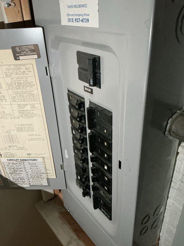 Conducted on-site electrical assessment for new whole home generator installation at manufactured home. Evaluated existing electrical panel configuration, documented main breaker capacity and individual circuit layout, and photographed circuit directory to determine load requirements and compatibility for generator integration with current electrical system.