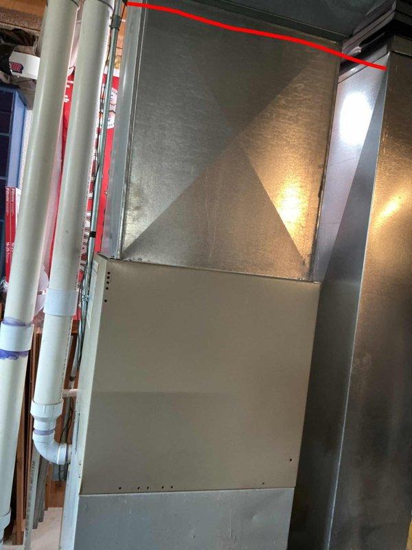Provided estimate for complete HVAC system replacement including natural gas furnace and air conditioning unit located in basement. Current equipment is operational but over 25 years old and has exceeded its useful service life. Assessed existing installation including air handler, ductwork, PVC venting system, and Nest thermostat for replacement specifications.
