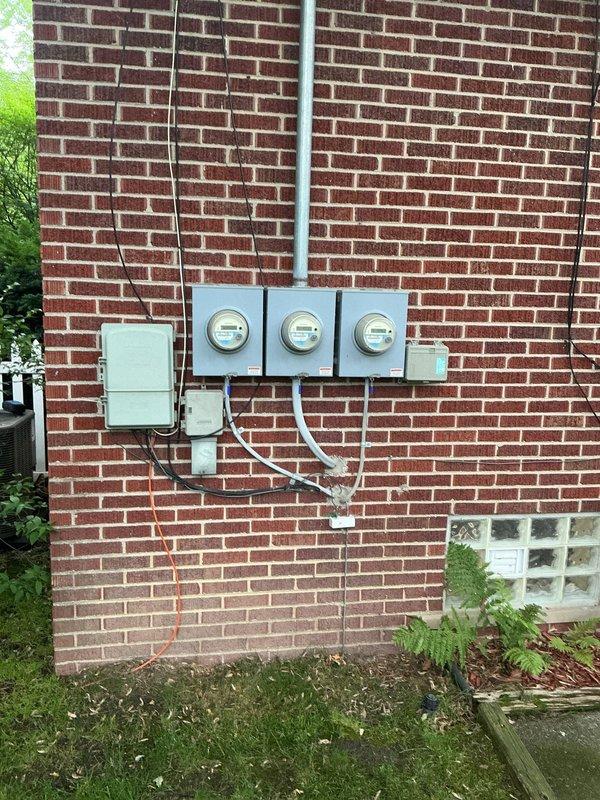 Responded to service call for 3-year-old cooling system in basement not cooling and blowing warm air. Upon arrival, performed diagnostic inspection of the unit and electrical system. Used Fieldpiece SC680 clamp meter to test electrical parameters including voltage, amperage, and system performance readings. Documented exterior electrical service and meter installation, as well as diagnostic measurements during troubleshooting process to identify root cause of cooling failure.