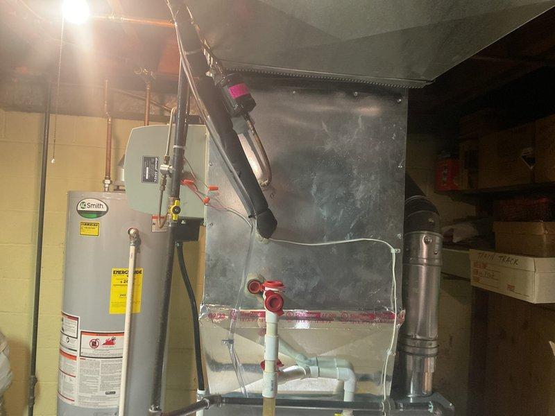 Responded to service call for sump pump motor running continuously and pulling water from unintended sources, causing basement floor flooding concerns. Upon arrival, conducted thorough inspection of basement utility area and sump pump system. Evaluated pump operation, discharge lines, and check valve functionality to identify source of continuous motor operation. Assessed water intrusion patterns and drainage system performance. Inspected surrounding plumbing infrastructure including water heater connections, HVAC condensate lines, and basement floor drains to determine if auxiliary water sources were contributing to pump basin overflow. Verified proper pump float switch operation and adjusted settings to prevent continuous cycling. Cleared any debris from pump intake and tested system under normal operating conditions to ensure proper activation and deactivation cycles. Confirmed pump discharge piping was clear and properly routed to exterior drainage point. System restored to proper 