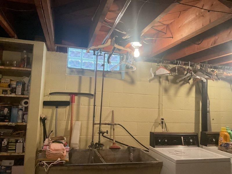 Responded to service call for sump pump motor running continuously and pulling water from unintended sources, causing basement floor flooding concerns. Upon arrival, conducted thorough inspection of basement utility area and sump pump system. Evaluated pump operation, discharge lines, and check valve functionality to identify source of continuous motor operation. Assessed water intrusion patterns and drainage system performance. Inspected surrounding plumbing infrastructure including water heater connections, HVAC condensate lines, and basement floor drains to determine if auxiliary water sources were contributing to pump basin overflow. Verified proper pump float switch operation and adjusted settings to prevent continuous cycling. Cleared any debris from pump intake and tested system under normal operating conditions to ensure proper activation and deactivation cycles. Confirmed pump discharge piping was clear and properly routed to exterior drainage point. System restored to proper 