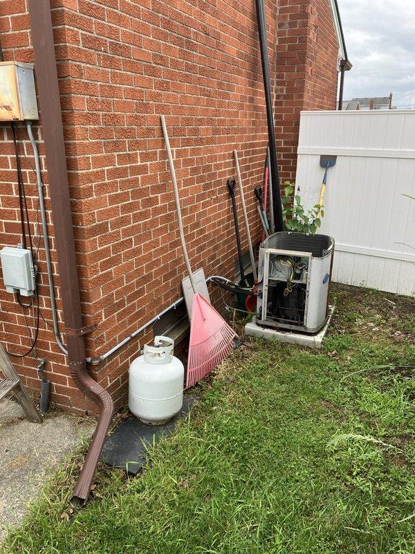 Provided estimate for replacement of non-functional evaporator coil serving basement-located HVAC system with natural gas furnace. Unit is 25+ years old and currently inoperative, requiring complete coil replacement to restore cooling functionality. Customer requested entry through side door for appointment access.