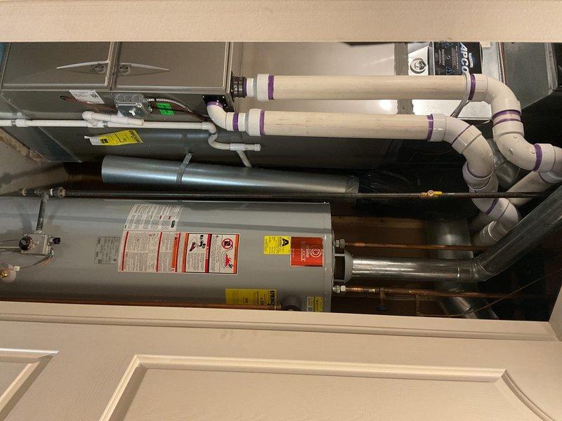 Performed routine maintenance flush on tanked water heater located in basement of 20-year-old residential property. Unit was operating properly with no reported symptoms or performance issues at time of service. Drained sediment buildup from tank bottom through drain valve, flushed system with fresh water to remove accumulated mineral deposits and debris, and refilled tank to restore normal operation. Inspected unit for any signs of corrosion, leaks, or component wear during maintenance procedure. All connections, pressure relief valve, and temperature settings verified to be within normal operating parameters. Provided customer with information regarding tankless water heater options as requested for future consideration.