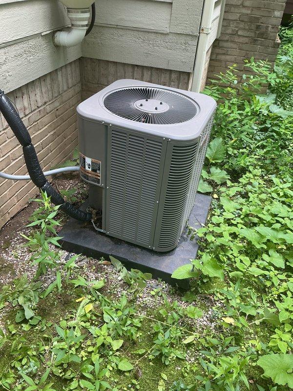 Completed comprehensive Gold AC Inspection on 3-year-old residential air conditioning system. Performed full system evaluation including refrigerant charge verification, electrical component testing, condensate drain inspection, airflow measurement, and thorough cleaning of outdoor condenser unit. Inspected condenser coils, verified proper fan operation, checked all electrical connections and capacitor function, measured temperature differential across evaporator coil, and confirmed thermostat calibration. Cleared vegetation growth around outdoor unit to ensure adequate airflow clearance and prevent future efficiency loss. All components operating within manufacturer specifications with no deficiencies noted. System performing optimally with proper cooling capacity and energy efficiency maintained.