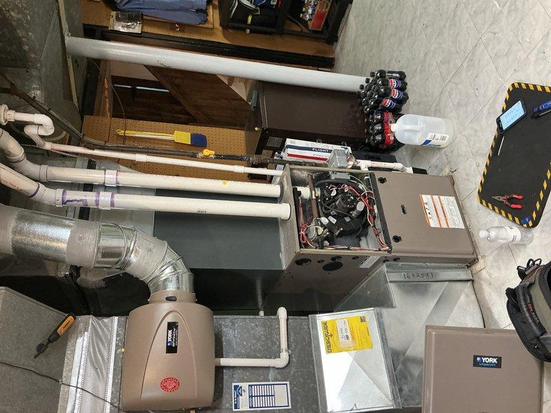 Completed comprehensive Gold AC inspection on 2010 HVAC system with air handler located in basement. Performed thorough evaluation of all system components including ductwork, refrigerant lines, electrical connections, and condensate drainage system. Advised customer to maintain clear area around outdoor condenser unit, removing any debris and animal waste to ensure proper airflow and system efficiency.