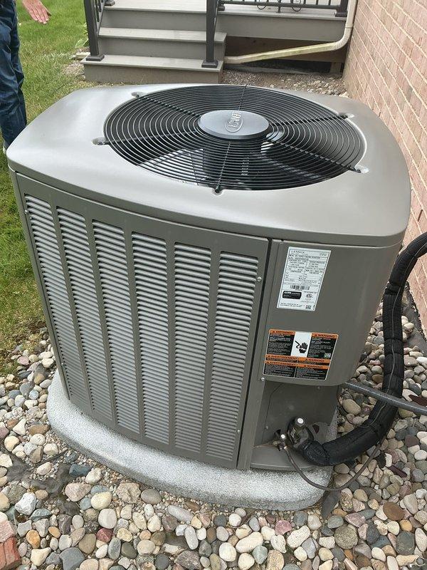 Completed comprehensive Gold-level preventive maintenance inspection on 2023 residential cooling system. Performed thorough evaluation of outdoor condenser unit, which was found properly installed on stable concrete pad with adequate clearance and ventilation. Inspected electrical connections, refrigerant lines, and condenser coil condition. Verified proper operation of condenser fan motor and compressor. Assessed indoor evaporator coil located in basement mechanical room. Checked all accessible system components for proper operation, wear, and potential service needs. Unit operating within normal parameters with no immediate repairs required. System demonstrates proper installation standards and maintenance condition consistent with equipment age.
