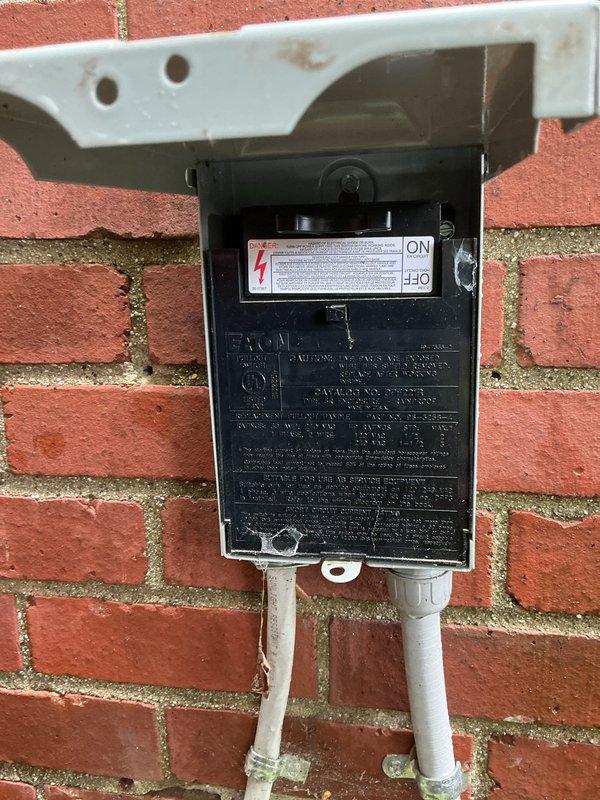 Completed yearly air conditioning tune-up and inspection on a 5-year-old outdoor condensing unit. Performed comprehensive system evaluation including refrigerant line inspection, electrical disconnect examination, and visual assessment of all accessible components. Unit operational with no immediate repairs required; documented equipment condition with photographic records showing normal wear consistent with age and outdoor exposure.