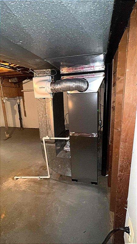 Completed installation of 3-ton air conditioning system with matching evaporator coil in rear yard location. Installed new indoor coil unit connected to existing furnace system in basement, ran refrigerant lines and electrical connections to outdoor condenser unit, and reconnected all ductwork. Mechanical, electrical, and air conditioning permits were requested and work was performed to code specifications.