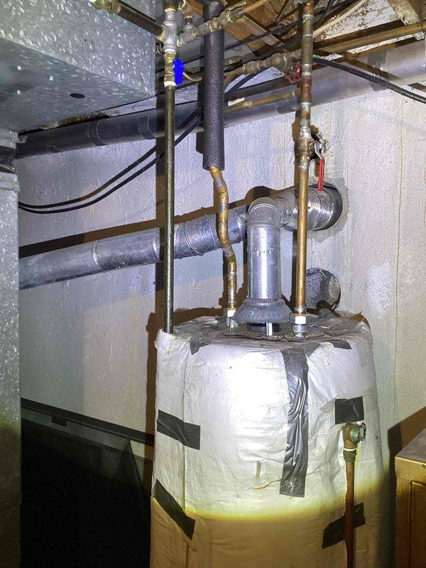 Responded to service call for non-cooling air conditioning system with thermostat malfunction. Upon inspection, determined the 10+ year old R22 cooling system located in basement had complete refrigerant loss. Provided comprehensive equipment replacement estimate for new HVAC system installation, including evaluation of existing ductwork infrastructure and mechanical room configuration to ensure proper sizing and compatibility with updated equipment.