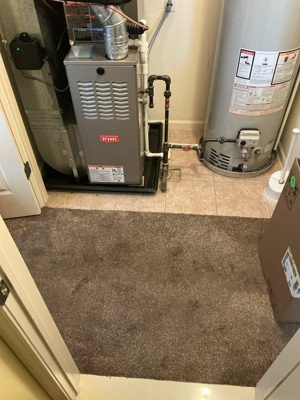 Completed installation of 2.5 ton Lennox air conditioning system with new evaporator coil in left side yard location. System was positioned on river rock base adjacent to brick wall exterior, with all refrigerant lines properly connected to existing Bryant furnace system in interior utility room. Obtained mechanical, electrical, and air conditioning permits, performed system flush, verified all connections, and successfully reconnected complete HVAC system to operational status.