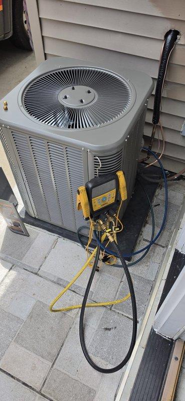 # HVAC Complete System Installation

Completed full HVAC system installation including a 70,000 BTU furnace and 2-ton air conditioning unit with all associated components. Installed new programmable thermostat, humidifier, and low-profile drain kit to optimize system performance and indoor air quality. Ran and secured all necessary PVC venting pipes with proper pitch and support, installed refrigerant lines with insulation, and connected electrical service to both units. Mounted outdoor condenser unit on concrete pad with proper clearances and secured all refrigerant connections. Performed system startup, verified proper airflow, checked refrigerant charge using digital manifold gauges, and confirmed all safety controls operational. Requested mechanical and electrical permits prior to installation. Reconnected existing ductwork and made necessary modifications for proper system integration. Measured and documented system specifications for utility rebate qualification. All work complet