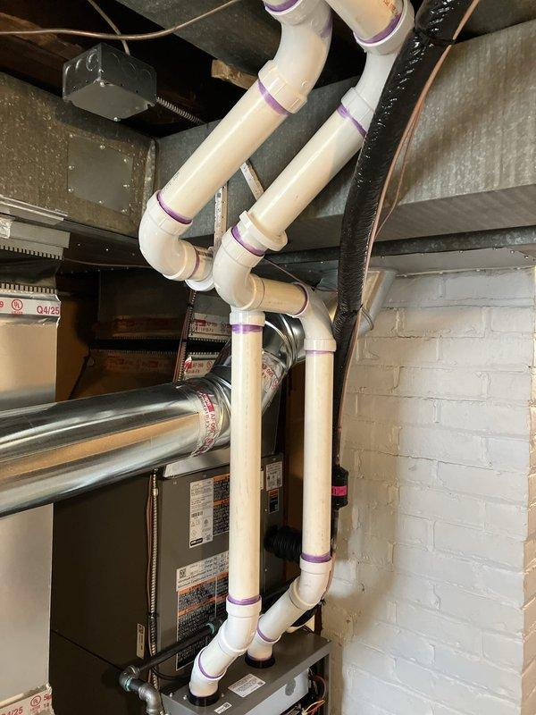 # HVAC Complete System Installation

Completed full HVAC system installation including a 70,000 BTU furnace and 2-ton air conditioning unit with all associated components. Installed new programmable thermostat, humidifier, and low-profile drain kit to optimize system performance and indoor air quality. Ran and secured all necessary PVC venting pipes with proper pitch and support, installed refrigerant lines with insulation, and connected electrical service to both units. Mounted outdoor condenser unit on concrete pad with proper clearances and secured all refrigerant connections. Performed system startup, verified proper airflow, checked refrigerant charge using digital manifold gauges, and confirmed all safety controls operational. Requested mechanical and electrical permits prior to installation. Reconnected existing ductwork and made necessary modifications for proper system integration. Measured and documented system specifications for utility rebate qualification. All work complet