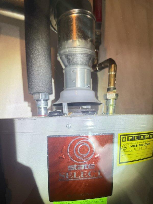 Completed comprehensive Gold AC inspection on 2-year-old Lennox outdoor condensing unit and associated basement air handler system. Performed full system evaluation including visual inspection of condenser unit mounted on concrete pad, verified proper refrigerant line connections via exterior PVC piping, checked electrical disconnect, and assessed overall equipment operation. Inspected basement mechanical components including water heater plumbing connections and HVAC system interfaces. All equipment found to be in proper working condition with no deficiencies noted during inspection.