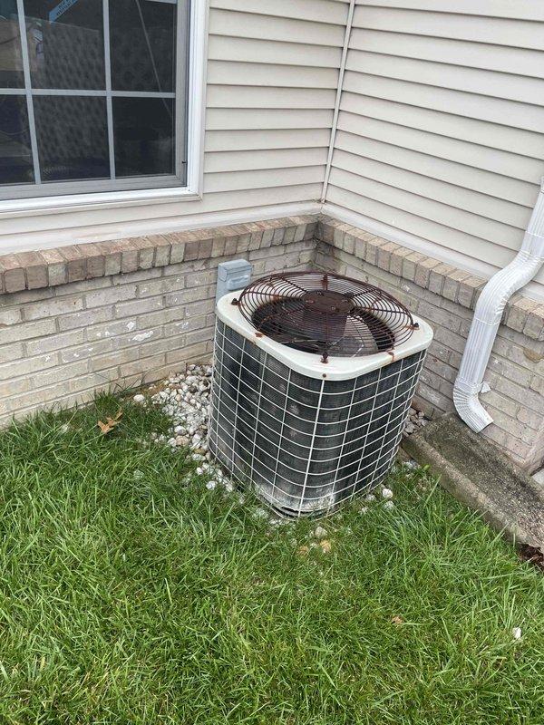 Completed estimate for replacement of existing furnace and air conditioning system. Current HVAC equipment is non-operational with AC unit confirmed low on refrigerant. Assessed outdoor condensing unit positioned at exterior foundation corner and indoor thermostat showing 77°F reading. Provided separate quotes for furnace and air conditioner replacement as requested to allow flexibility in equipment replacement options.