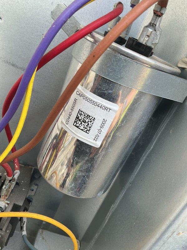 Responded to no-cooling complaint on central air conditioning system. Upon inspection, diagnosed failed capacitor preventing compressor and condenser fan operation. Replaced defective dual-run capacitor with proper replacement unit, restored all electrical connections, and verified system returned to normal cooling operation with proper amperage draws on both compressor and fan motor.