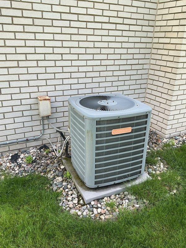 Responded to no-cooling complaint on central air conditioning system. Upon inspection, diagnosed failed capacitor preventing compressor and condenser fan operation. Replaced defective dual-run capacitor with proper replacement unit, restored all electrical connections, and verified system returned to normal cooling operation with proper amperage draws on both compressor and fan motor.
